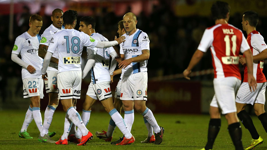 Melbourne City FC players celebrate one of Aaron Mooy's two goals.