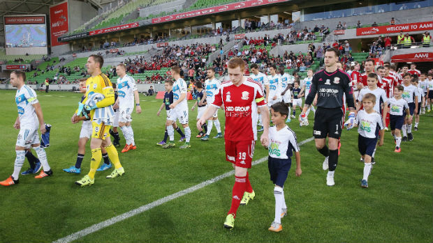 Hume City and Melbourne Victory players enter AAMI Park for their Westfield FFA Cup semi-final.