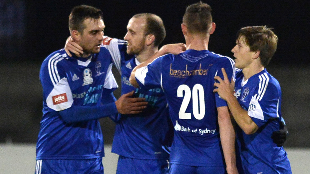 South Melbourne players celebrate a goal in their 6-1 win over Frankston Pines.