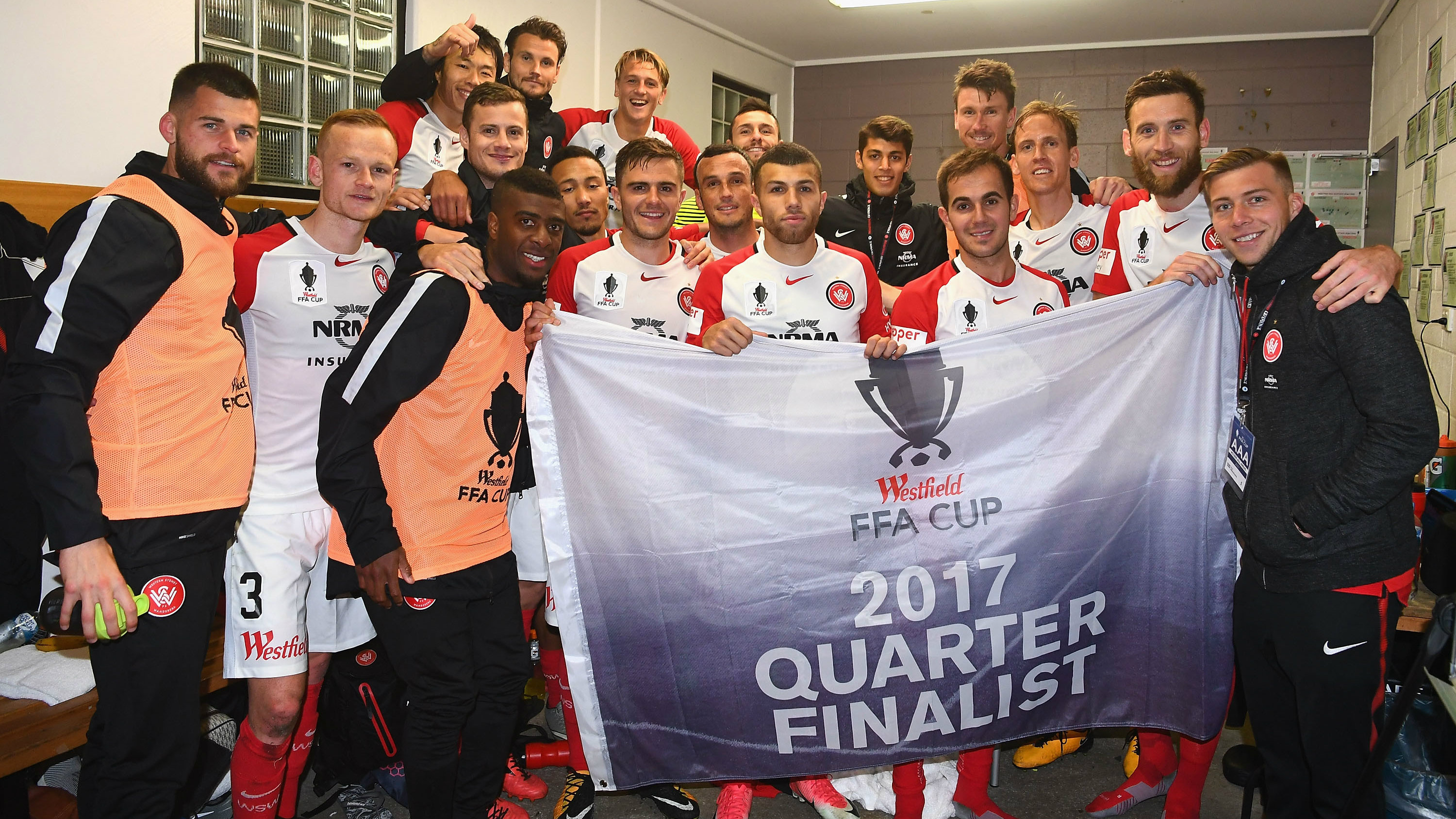 Wanderers players celebrate progressing to the FFA Cup Quarter Finals.