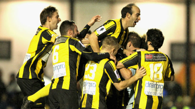 South Springvale players celebrate scoring against South Cardiff in last season's Westfield FFA Cup.