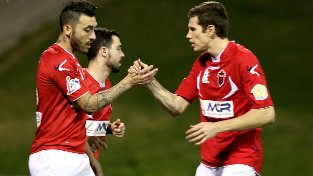 Josh MacDonald celebrates scoring for the Wolves in their weekend win over Parramatta FC. Image courtesy Pedro Garcia.