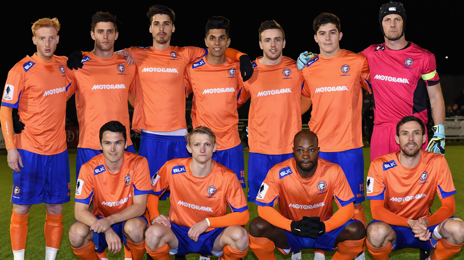 Lions FC players pose for a team photo prior to their clash with Croydon Kings.
