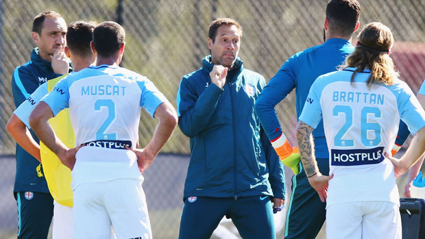 John Van't Schip gives instructions to his players during a Melbourne City training session.