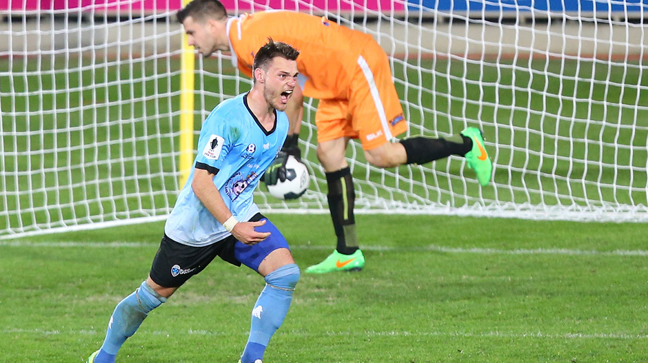 Florian Matk of Palm Beach celebrates equalising against South Melbourne FC.