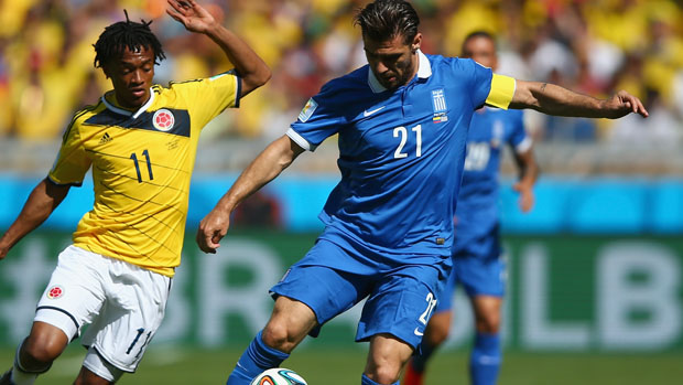 Kostas Katsouranis in action for Greece at the 2014 FIFA World Cup.