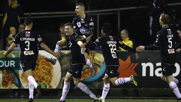 Blacktown players celebrate a goal in their 3-2 win over the Mariners.