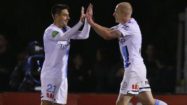 City striker Bruno Fornaroli celebrates with Aaron Mooy after the latter found the back of the net.